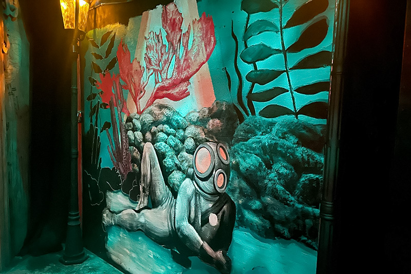 mural of a deep sea diver under the water